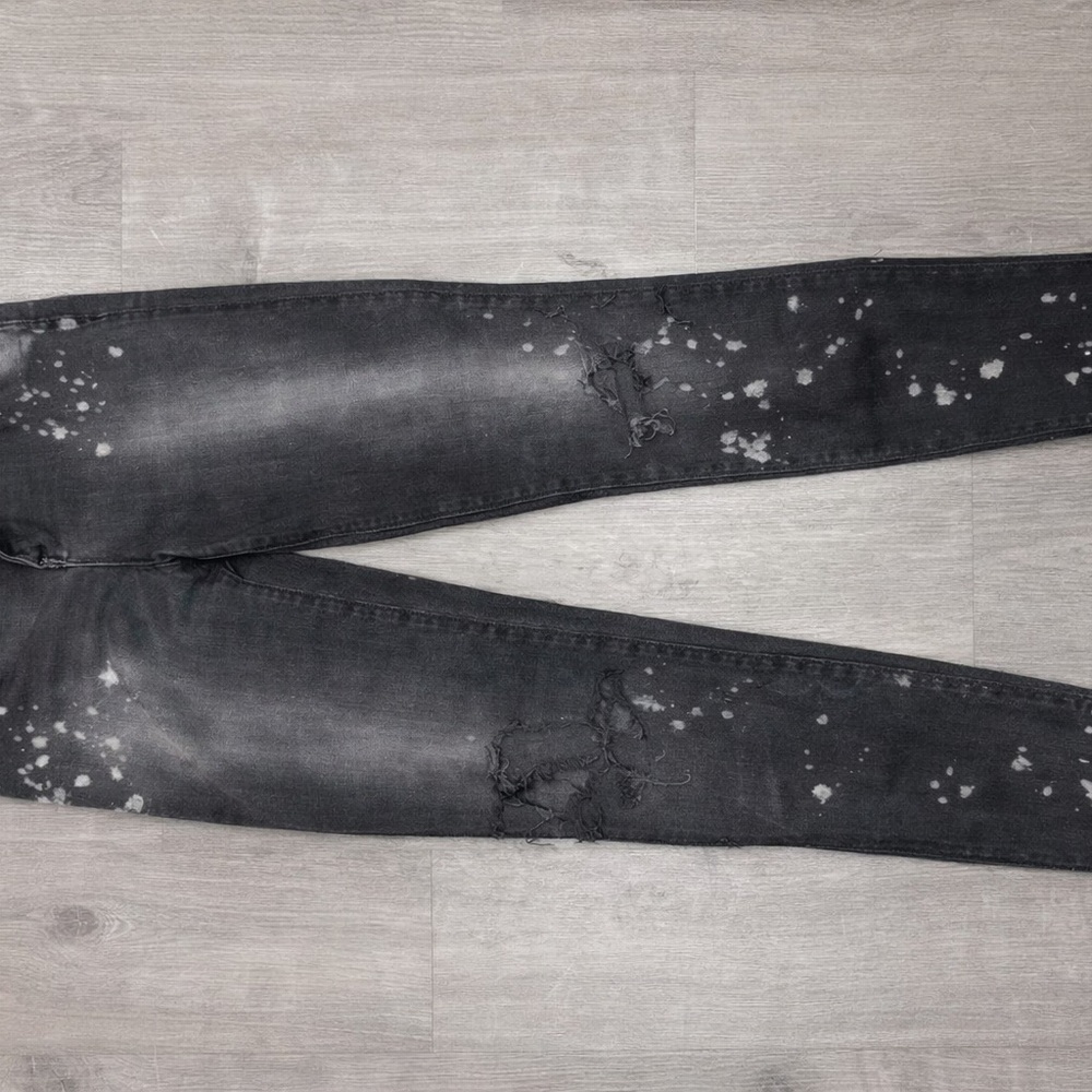 J Brand Black Distressed Skinny Jeans with Bleach Splatter